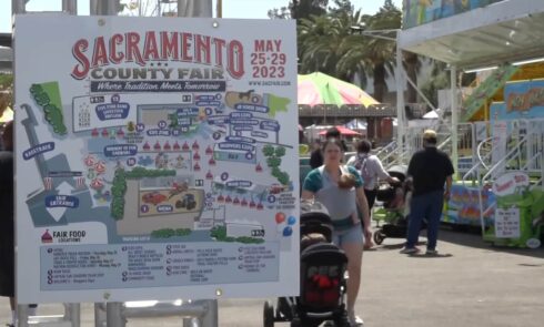 Signpost detailing the Sacramento County Fair map and events for May 2023