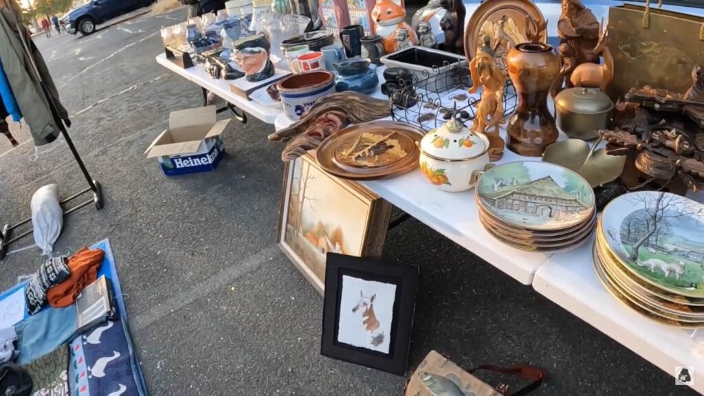 Outdoor antique market stall with various vintage items