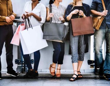 Group of people with shopping bags